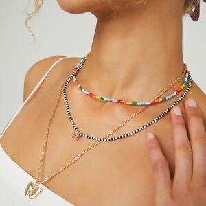 Layered Bead Necklace with Butterfly Pendants